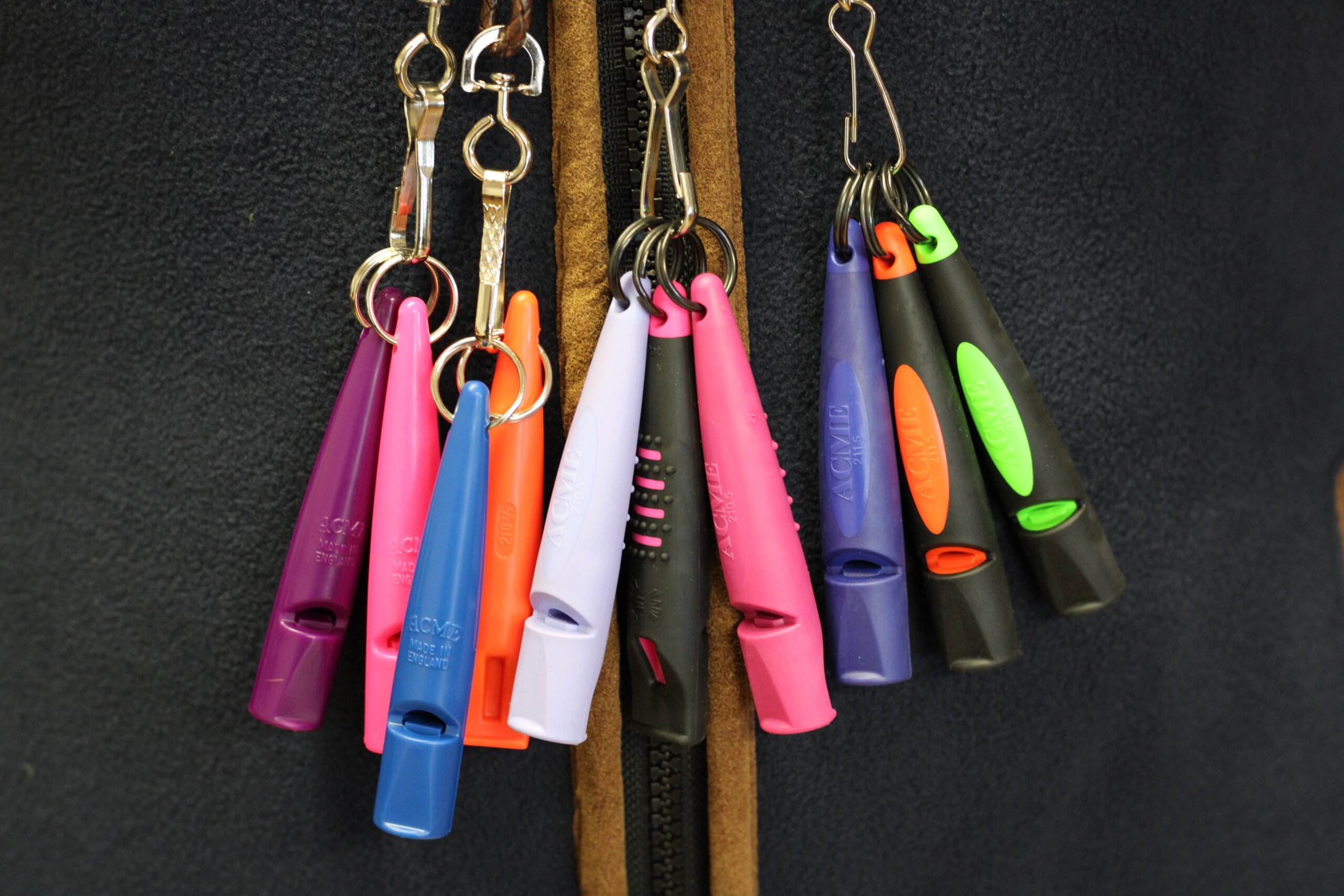 Lanyards of multicored ACME whistles.